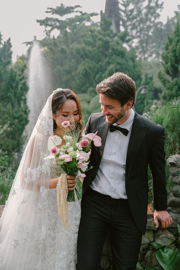 Real bride wearing The Dong Khoi — Lace Flower Cathedral Veil