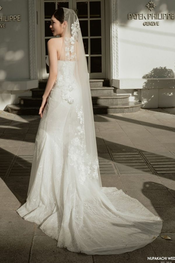 The Hai Van lace appliqué cathedral wedding veil with a long train