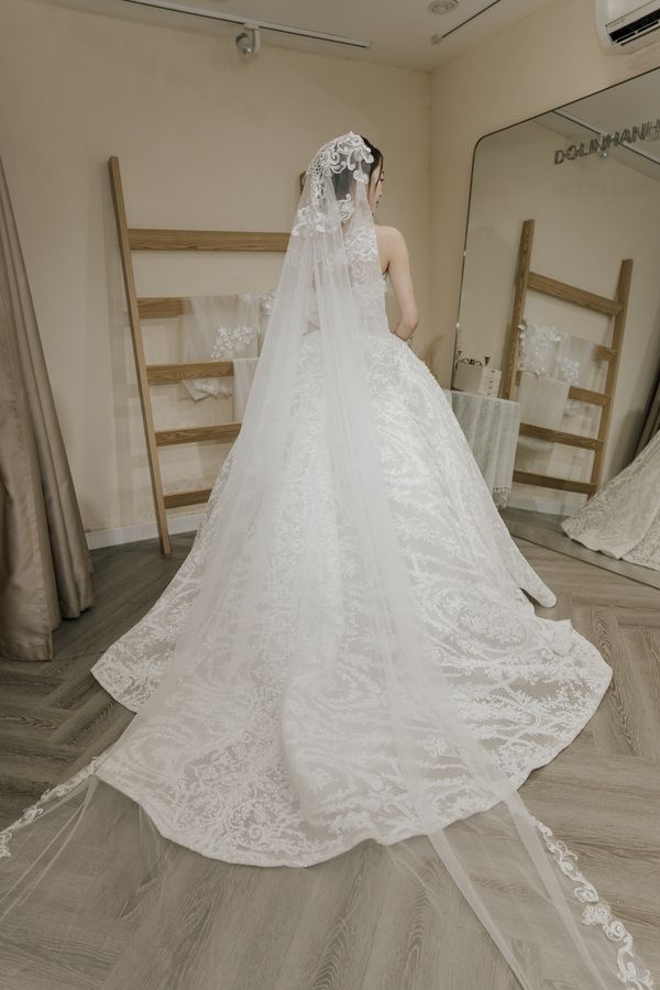 Cathedral lace veil in the DoLinhAnh Bridal atelier