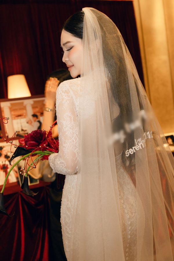 The Lotus Personalized Embroidered Cathedral Veil, photographed in Vietnam