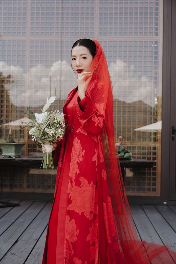 The Red River red veil with a red ao dai